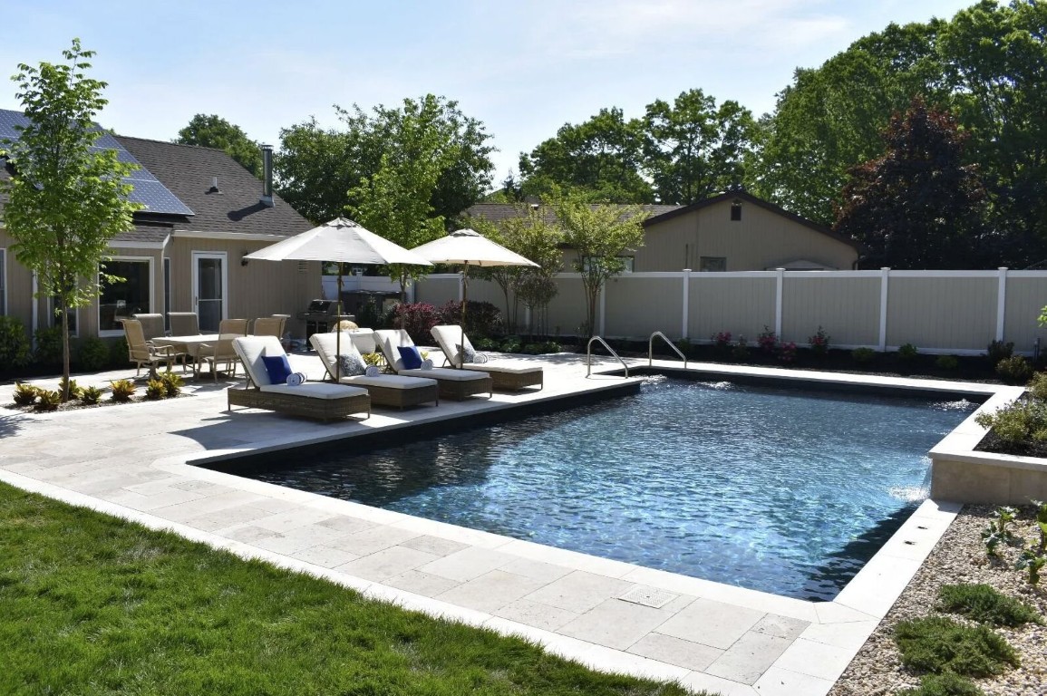 Beautiful luxury pool with lounge chairs and professional maintenance in Prescott, AZ