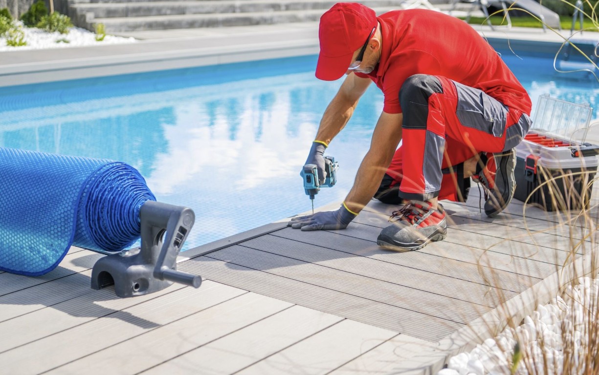 Pool technician performing equipment maintenance and repairs in Prescott, AZ
